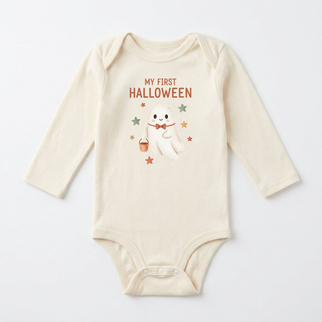 Dress your little one in the Toodleroos Long-Sleeve Baby’s First Halloween Onesie – Cute Ghost Bodysuit, featuring a cream color, an adorable ghost with stars and candy, and “My First Halloween” printed above. This charming outfit is perfect to celebrate their very first Halloween!.