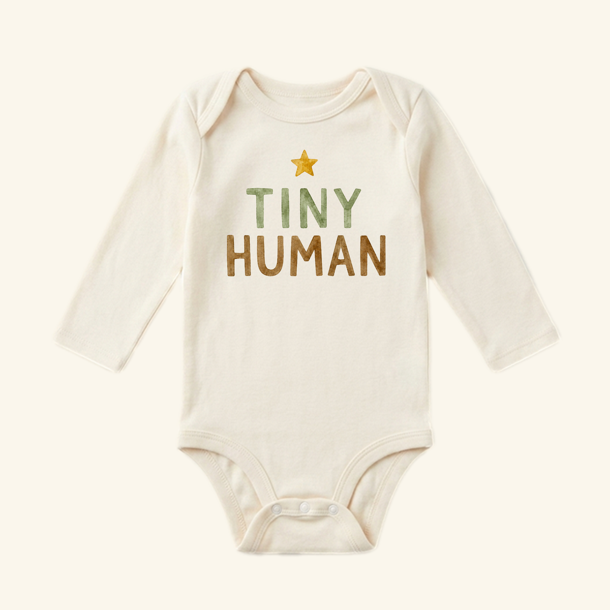Toodleroos Tiny Human Baby Onesie – Minimalist Star Bodysuit with a yellow star graphic above the text TINY HUMAN in green and brown letters.