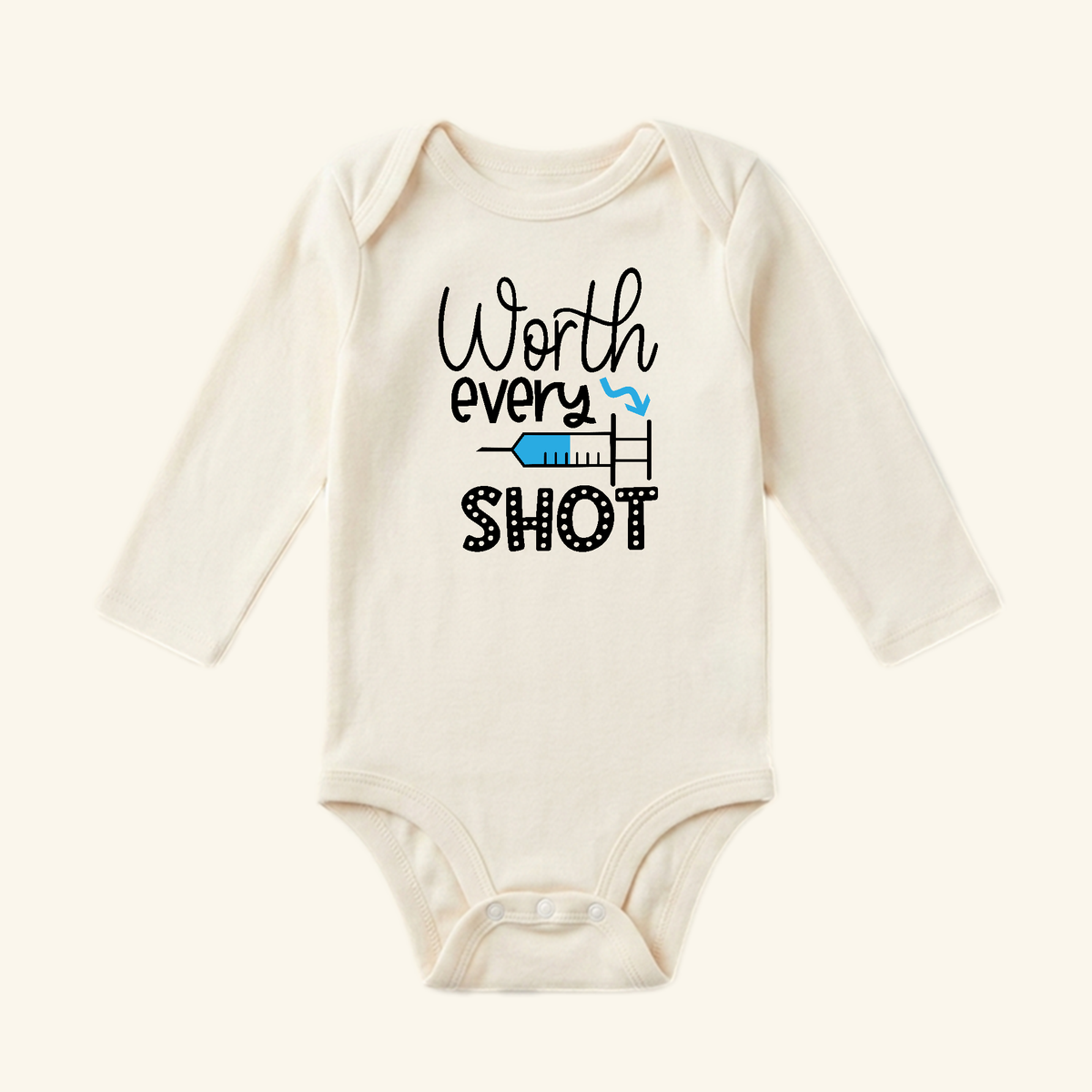 Toodleroos IVF Baby Onesie – Worth Every Shot Fertility Journey Bodysuit featuring a long-sleeve design with a blue syringe graphic and the text Worth every SHOT.
