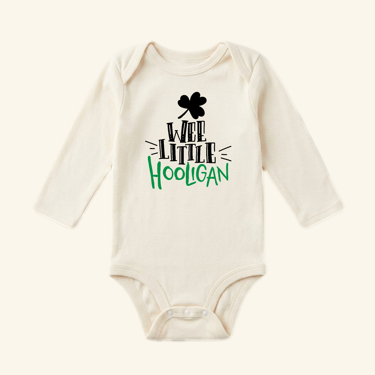 St. Patrick’s Day Baby Onesie – Wee Little Hooligan Bodysuit with a black shamrock and text in black and green, perfect as a funny St. Patrick’s Day baby gift.