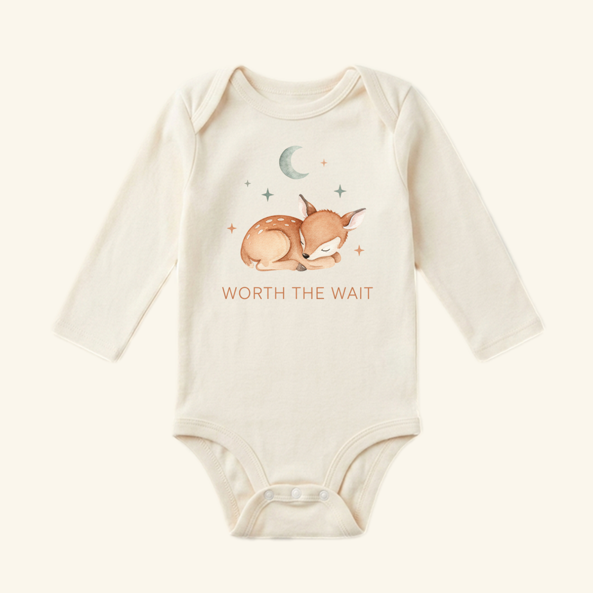 Worth the Wait Baby Onesie – Sleeping Deer Bodysuit featuring a long-sleeve woodland design with a sleeping deer illustration, moon, stars, and the text WORTH THE WAIT.