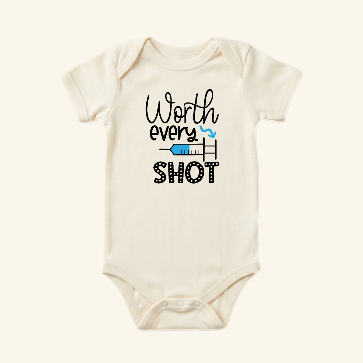 Toodleroos IVF Baby Onesie – Worth Every Shot Fertility Journey Bodysuit in cream, featuring the text Worth every SHOT with a blue syringe graphic integrated into the lettering.