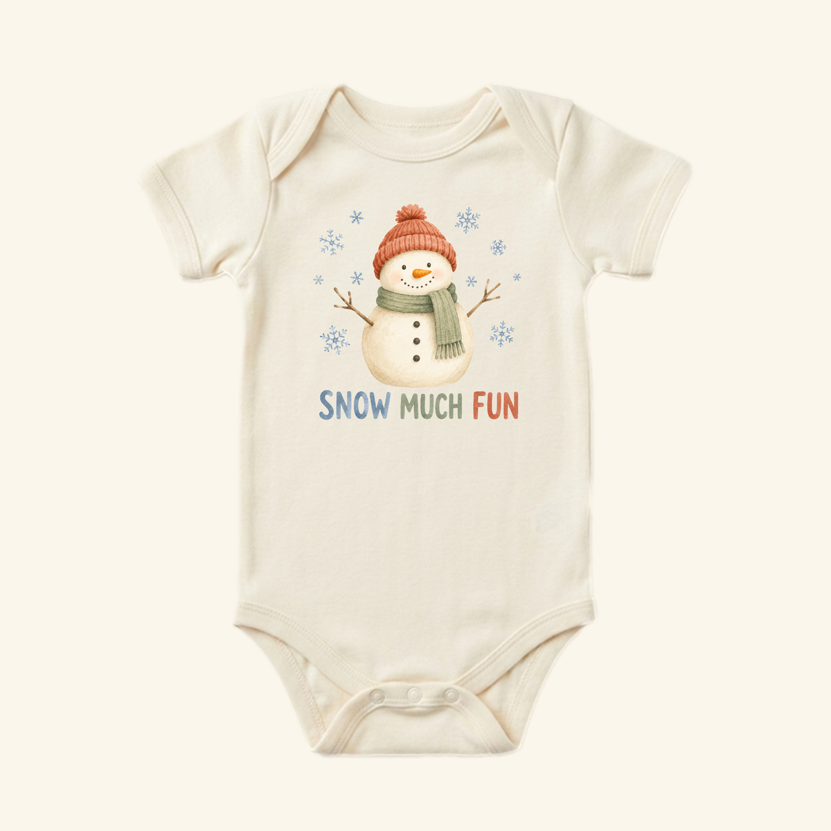 Dress your little one in the Toodleroos Snowman Baby Onesie – Snow Much Fun Winter Bodysuit, featuring a smiling snowman with red hat, green scarf, and colorful SNOW MUCH FUN text—perfect for winter fun!.