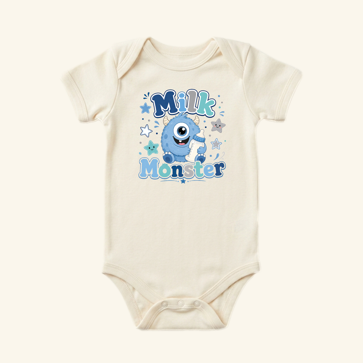 Cream-colored Funny Baby Onesie – Milk Monster Bodysuit featuring a cartoon blue monster holding a baby bottle, surrounded by stars and the text Milk Monster.