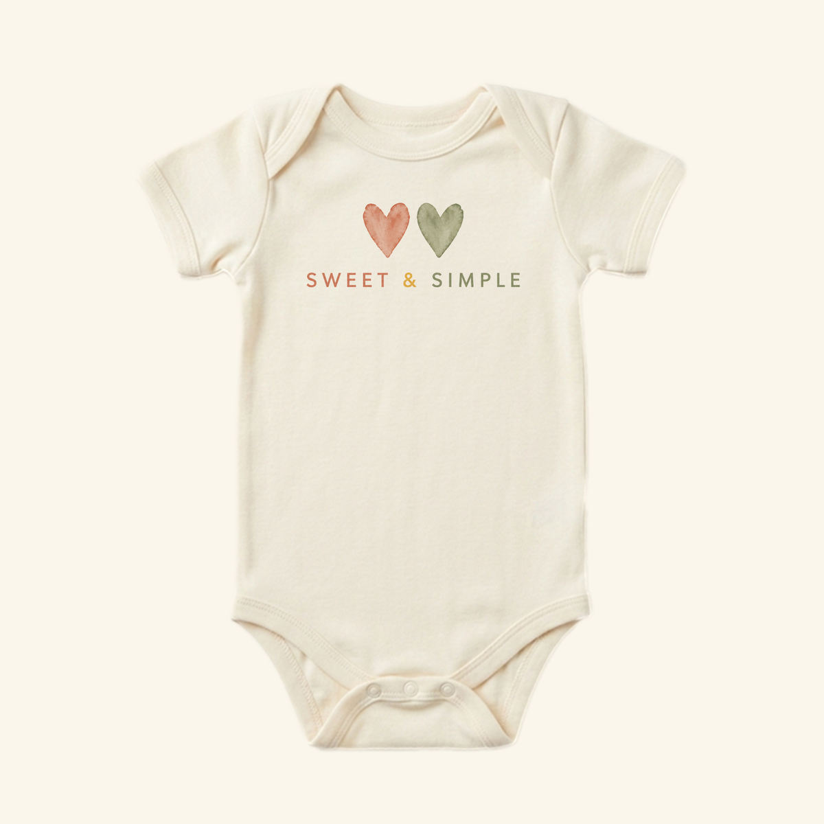 Toodleroos Gender-Neutral Baby Onesie – Sweet & Simple Heart Bodysuit in cream, featuring two watercolor hearts and the text SWEET & SIMPLE.
