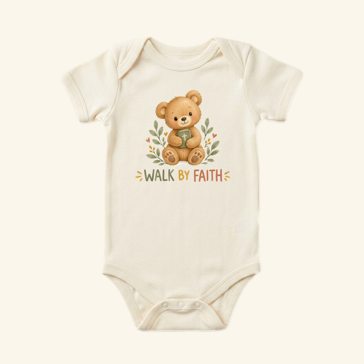The Toodleroos Christian Baby Onesie – Walk by Faith Bear Bodysuit features a cream color and a cute teddy bear among leaves, making it the ideal Christian baby gift.