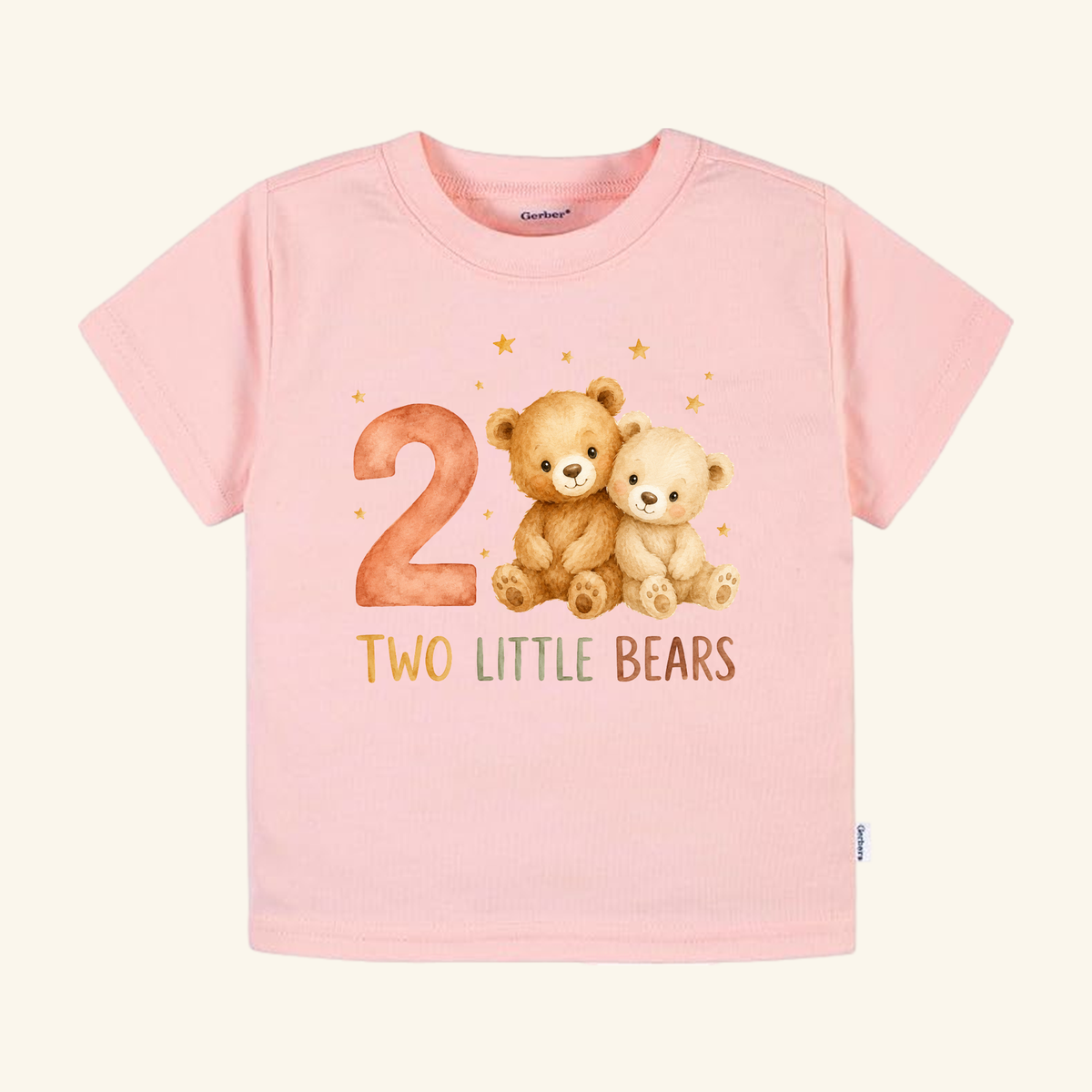 Light pink Two Little Bears 2nd Birthday Toddler Shirt – Short-Sleeve Tee featuring a large number two, two illustrated teddy bears, the text TWO LITTLE BEARS, and small gold stars.