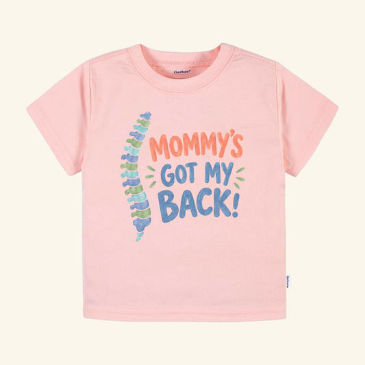 Light pink toddler t-shirt featuring a colorful spine anatomy graphic and the text MOMMYS GOT MY BACK! on this Mommy’s Got My Back Toddler Shirt.
