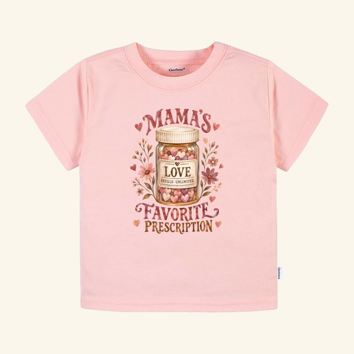 Pink Mama’s Favorite Prescription Toddler Shirt featuring a medicine bottle graphic filled with hearts, labeled Mamas Love, Refills: Unlimited, and Favorite Prescription.
