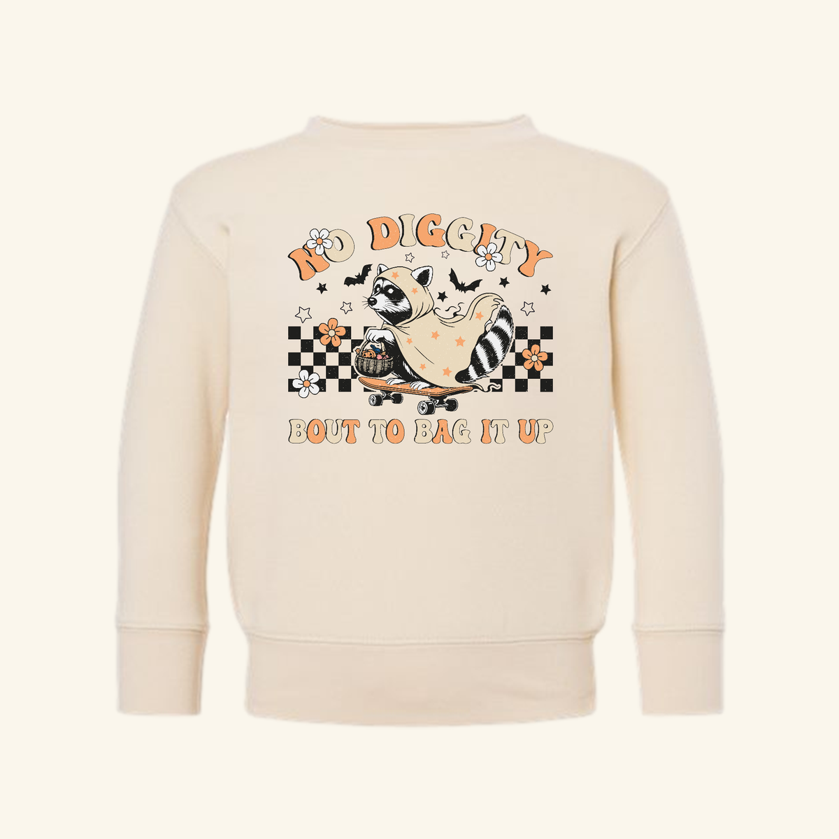 Cream No Diggity Bout to Bag It Up Toddler Sweatshirt featuring a retro-style graphic of a raccoon on a skateboard holding a treat basket with the text NO DIGGITY BOUT TO BAG IT UP.
