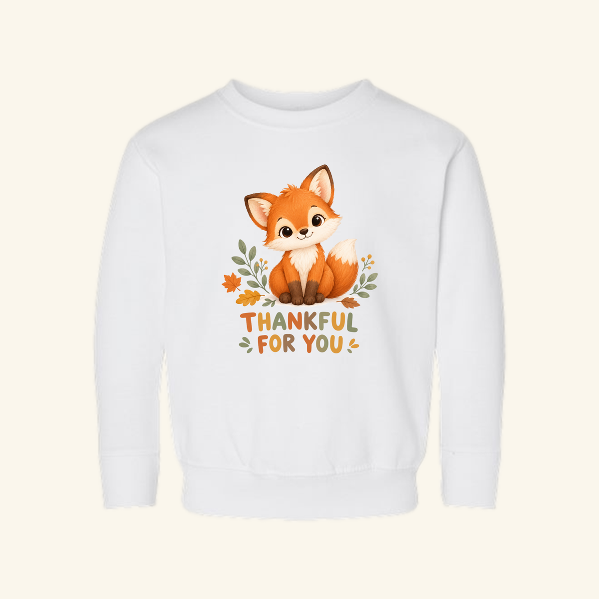 White Thankful for You Toddler Sweatshirt – Cute Fall Fox Pullover featuring an illustration of a fox surrounded by autumn leaves and the text Thankful for You.