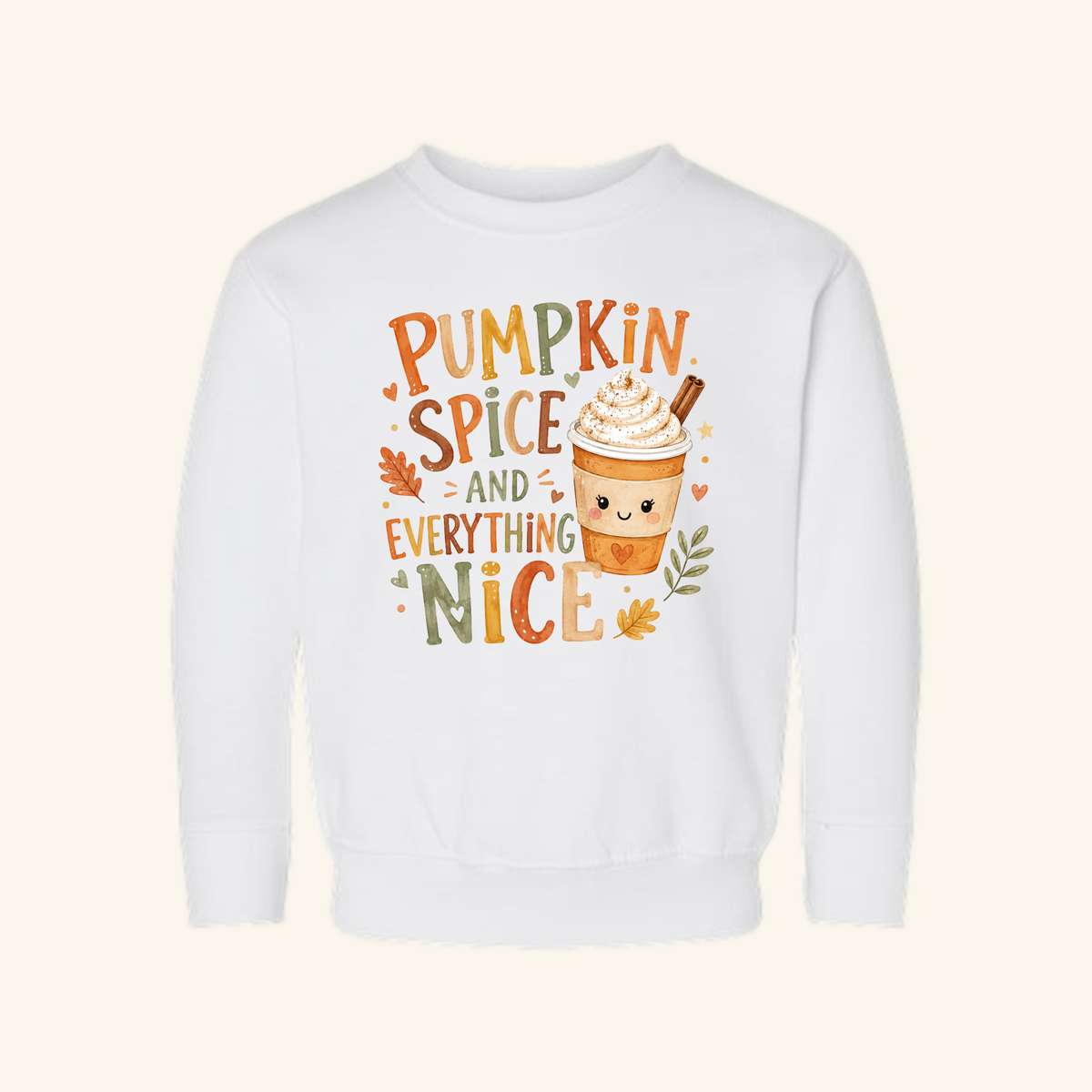 Toodleroos Pumpkin Spice and Everything Nice Toddler Sweatshirt featuring a white crewneck with a smiling latte cup graphic, surrounded by the text Pumpkin Spice and Everything Nice and colorful fall leaves.