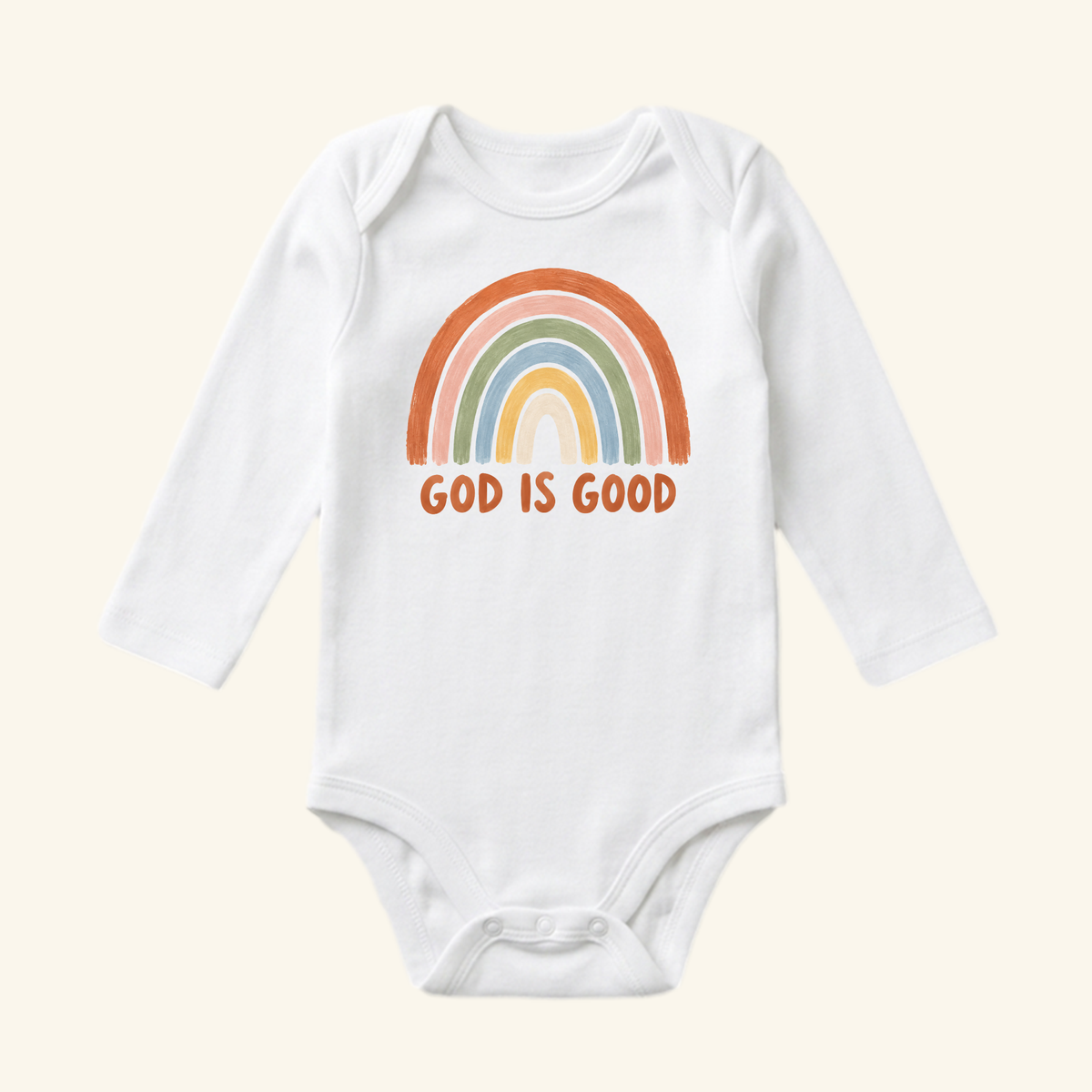 The Christian Baby Onesie – God Is Good Rainbow Bodysuit by Toodleroos features a painted rainbow and God is Good in orange—an ideal Christian baby gift.