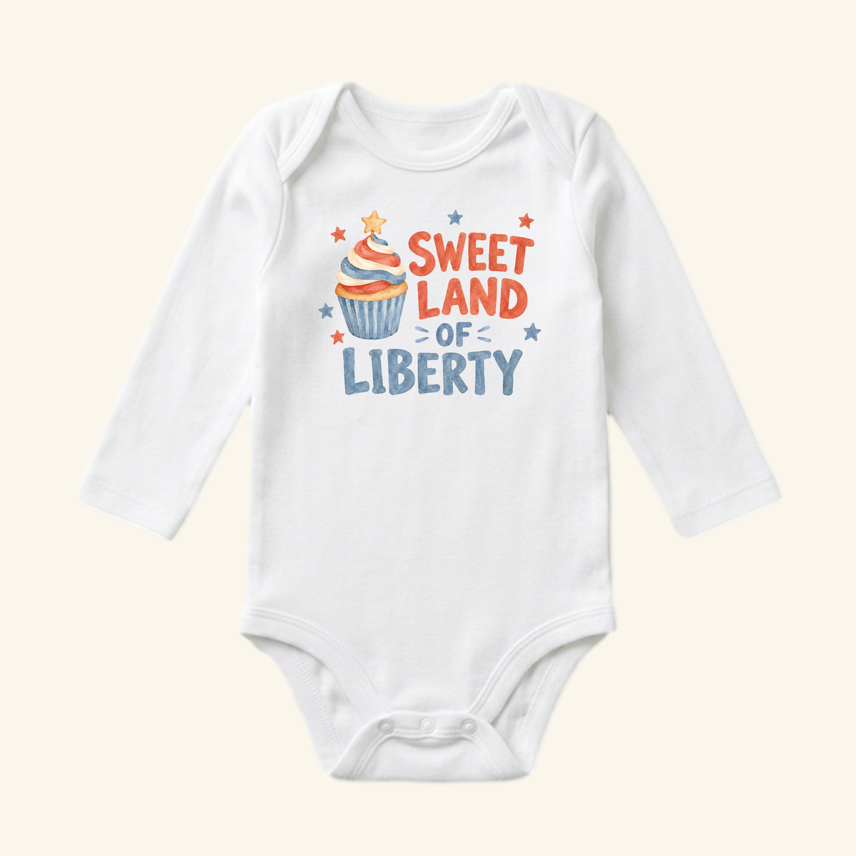 Toodleroos Sweet Land of Liberty Baby Onesie – Patriotic Cupcake Bodysuit featuring a white long-sleeve design with a red, white, and blue cupcake graphic surrounded by small stars.