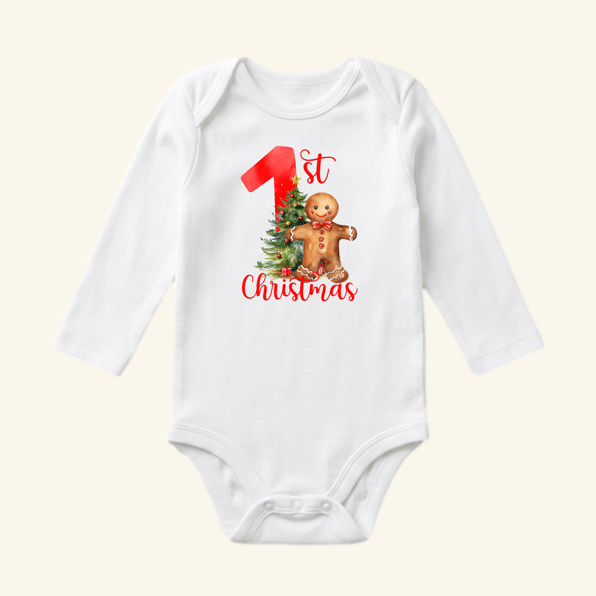 Toodleroos Baby’s First Christmas Onesie – Gingerbread Holiday Bodysuit: a white long-sleeve bodysuit featuring a gingerbread man, a small Christmas tree, and the text 1st Christmas.