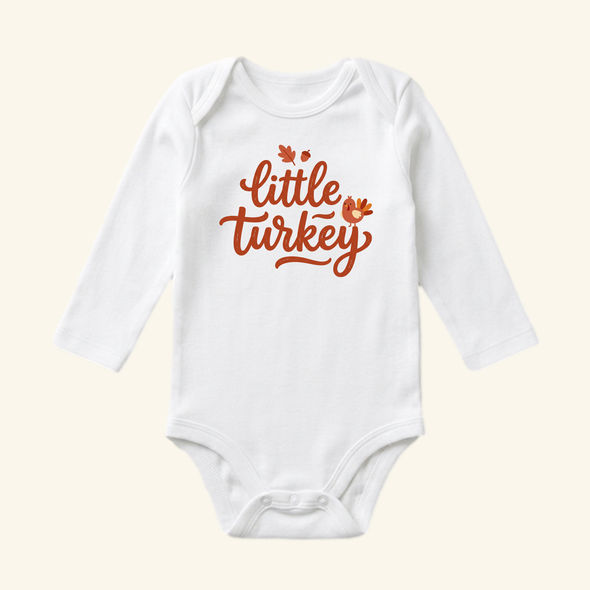 White long-sleeve Little Turkey Baby Onesie – Hand-Lettered Thanksgiving Bodysuit with a small brown and orange turkey graphic, perfect for a baby’s first Thanksgiving.