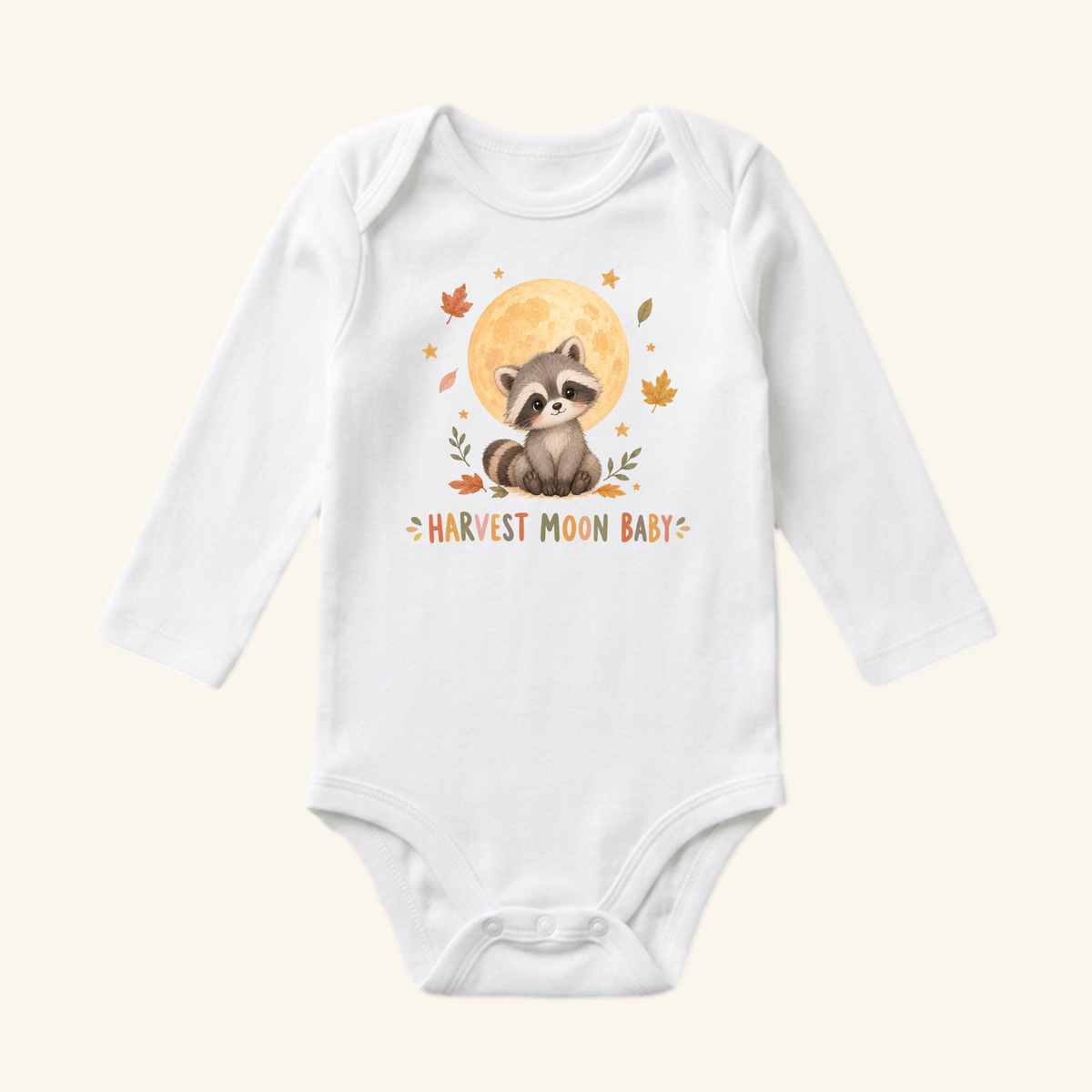 Toodleroos Harvest Moon Baby Onesie – Fall Raccoon Bodysuit featuring a raccoon sitting before a full moon, surrounded by autumn leaves and the text HARVEST MOON BABY on a white long-sleeve baby bodysuit.