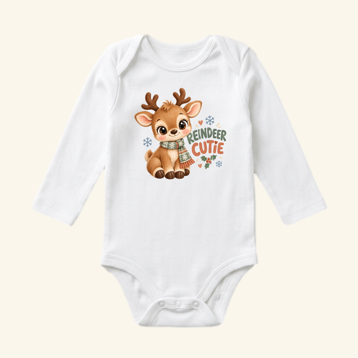 Reindeer Cutie Baby Onesie featuring a white long-sleeve bodysuit with a cartoon reindeer wearing a scarf and the text REINDEER CUTIE.