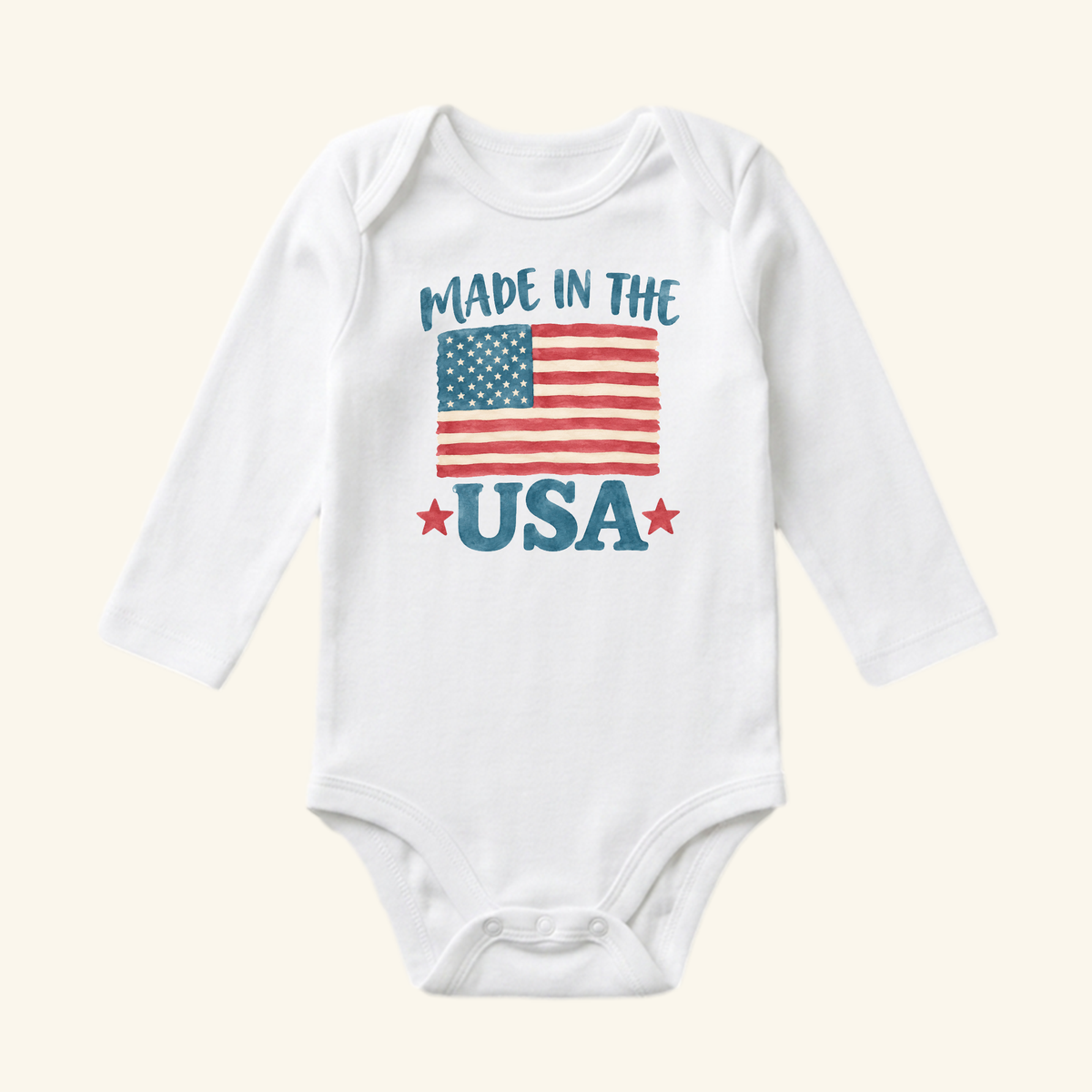 White, long-sleeved Toodleroos Made in the USA Baby Onesie – Patriotic American Flag Bodysuit featuring an American flag graphic, two red stars, and the text MADE IN THE USA.