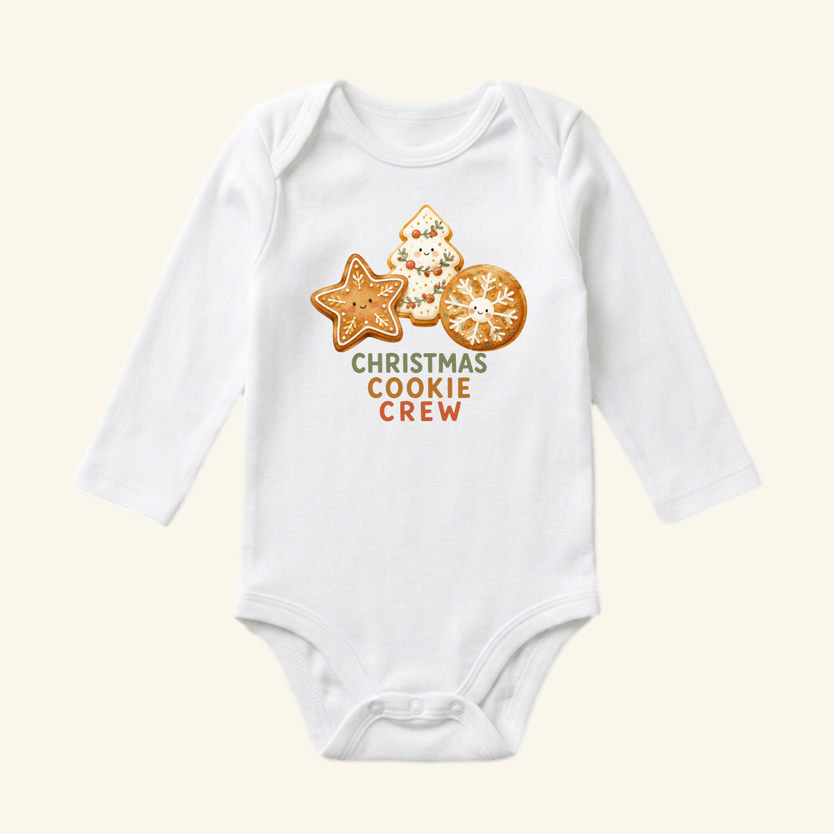 Toodleroos Christmas Cookie Crew Baby Onesie: a white long-sleeve onesie featuring a graphic of three smiling decorated cookies and the text CHRISTMAS COOKIE CREW.