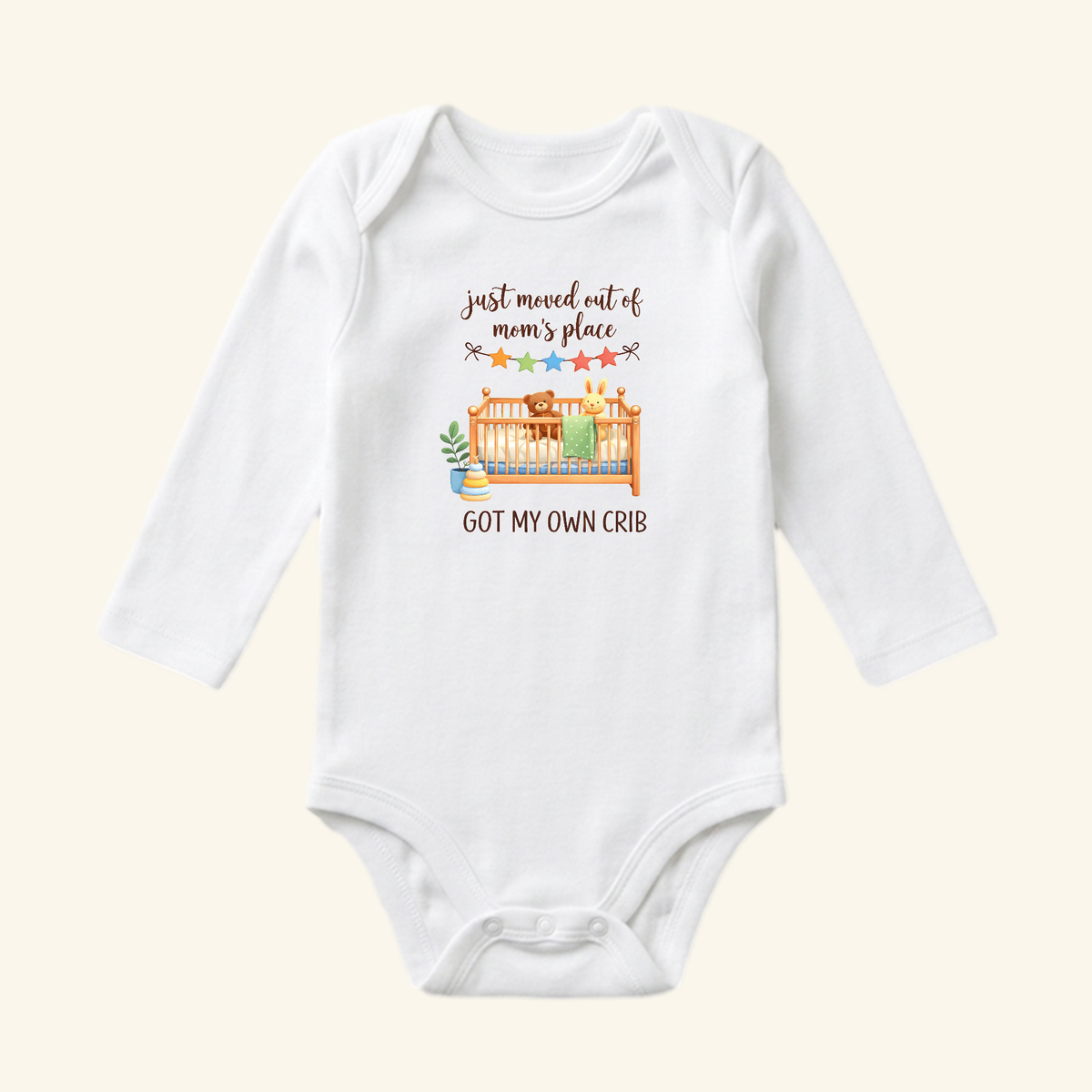 Funny Baby Onesie – Got My Own Crib Bodysuit is a white long-sleeve baby bodysuit featuring a teddy bear and rabbit in a crib with the text Just moved out of mom’s place and got my own crib.
