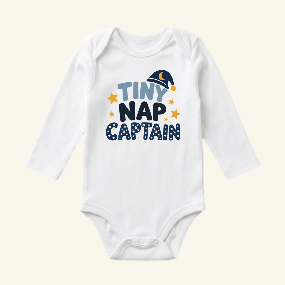 White long-sleeve Funny Baby Onesie – Tiny Nap Captain Sleepy Baby Bodysuit featuring a nightcap graphic and the text TINY NAP CAPTAIN.