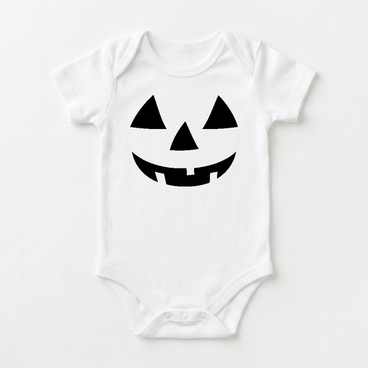 Dress your little one in the Jack-O-Lantern Face Baby Onesie – Halloween Bodysuit, a white baby outfit featuring a classic black jack-o-lantern face with triangle eyes, a triangle nose, and a wide smile with two teeth—making it the perfect playful choice for baby’s first Halloween.