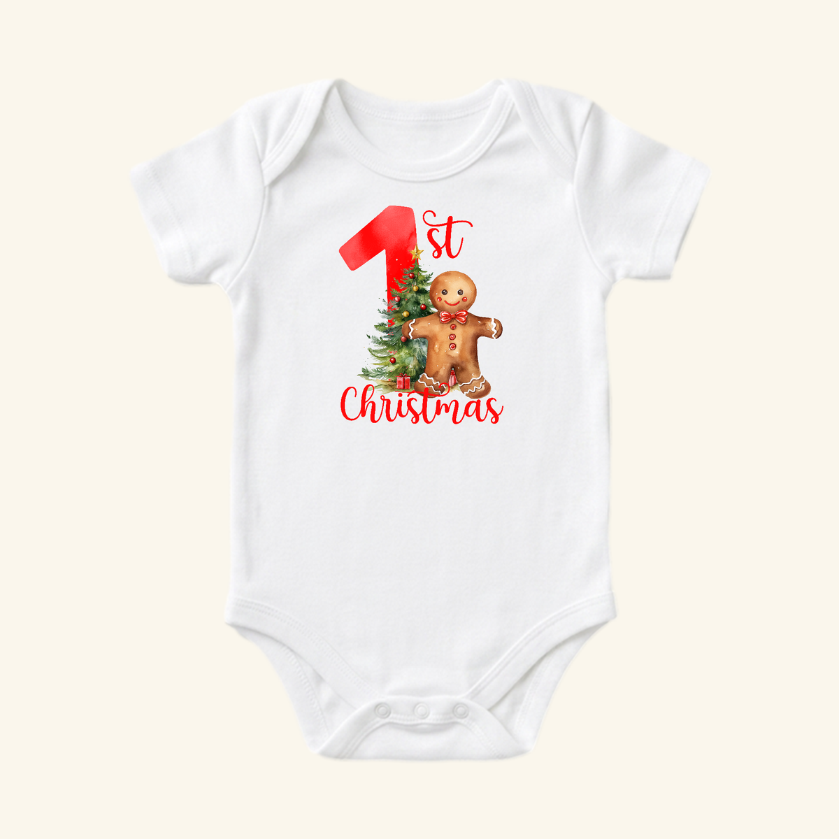 White Baby’s First Christmas Onesie – Gingerbread Holiday Bodysuit featuring a gingerbread man standing in front of a Christmas tree with the red text 1st Christmas.