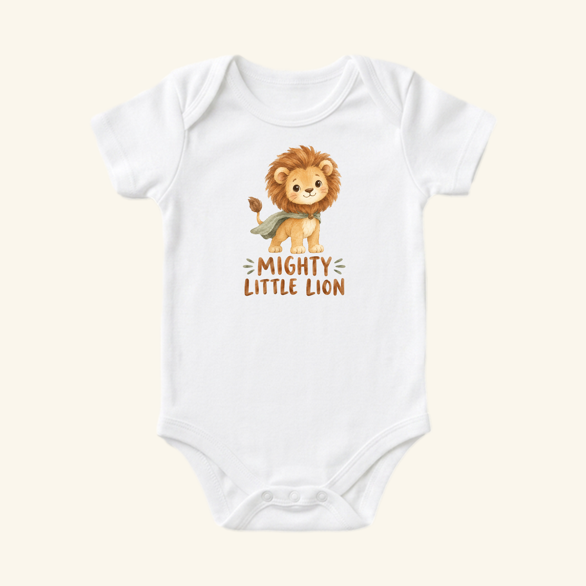 White Toodleroos Mighty Little Lion Baby Onesie – Cute Caped Lion Cub Bodysuit featuring a cartoon lion cub wearing a cape with the text Mighty Little Lion printed below.