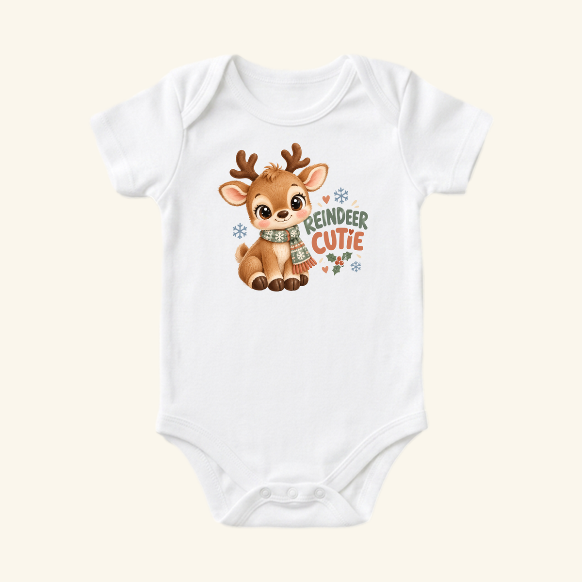 White Reindeer Cutie Baby Onesie – Cute Christmas Reindeer Bodysuit featuring an illustration of a reindeer wearing a scarf with the text REINDEER CUTIE.