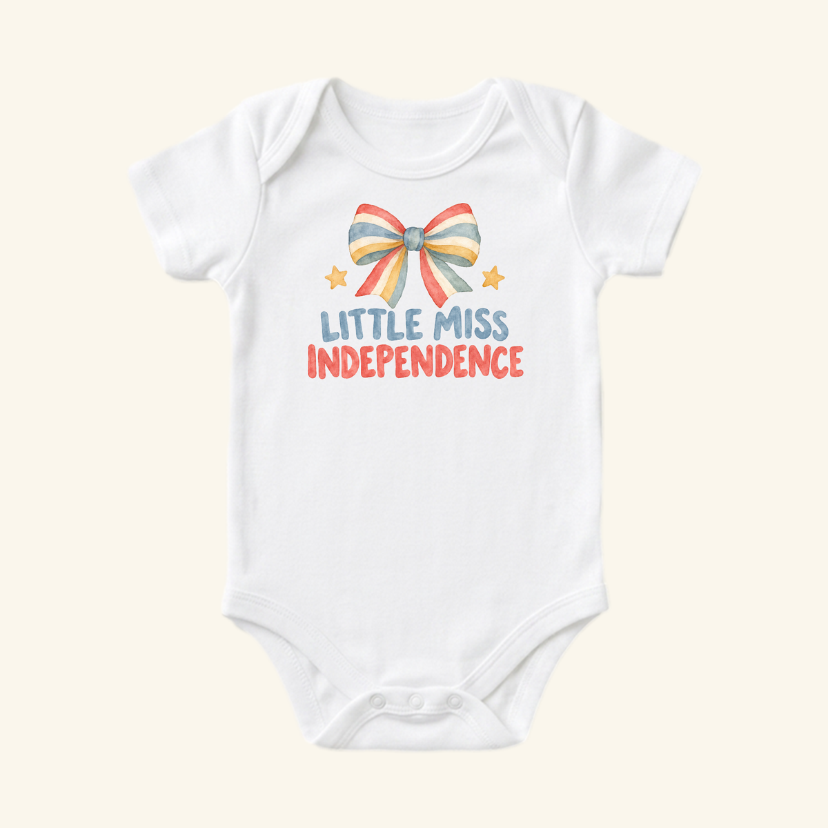 Little Miss Independence Baby Onesie – Patriotic Bow Bodysuit featuring a watercolor graphic of a red, white, and blue bow, two small stars, and the text LITTLE MISS INDEPENDENCE.
