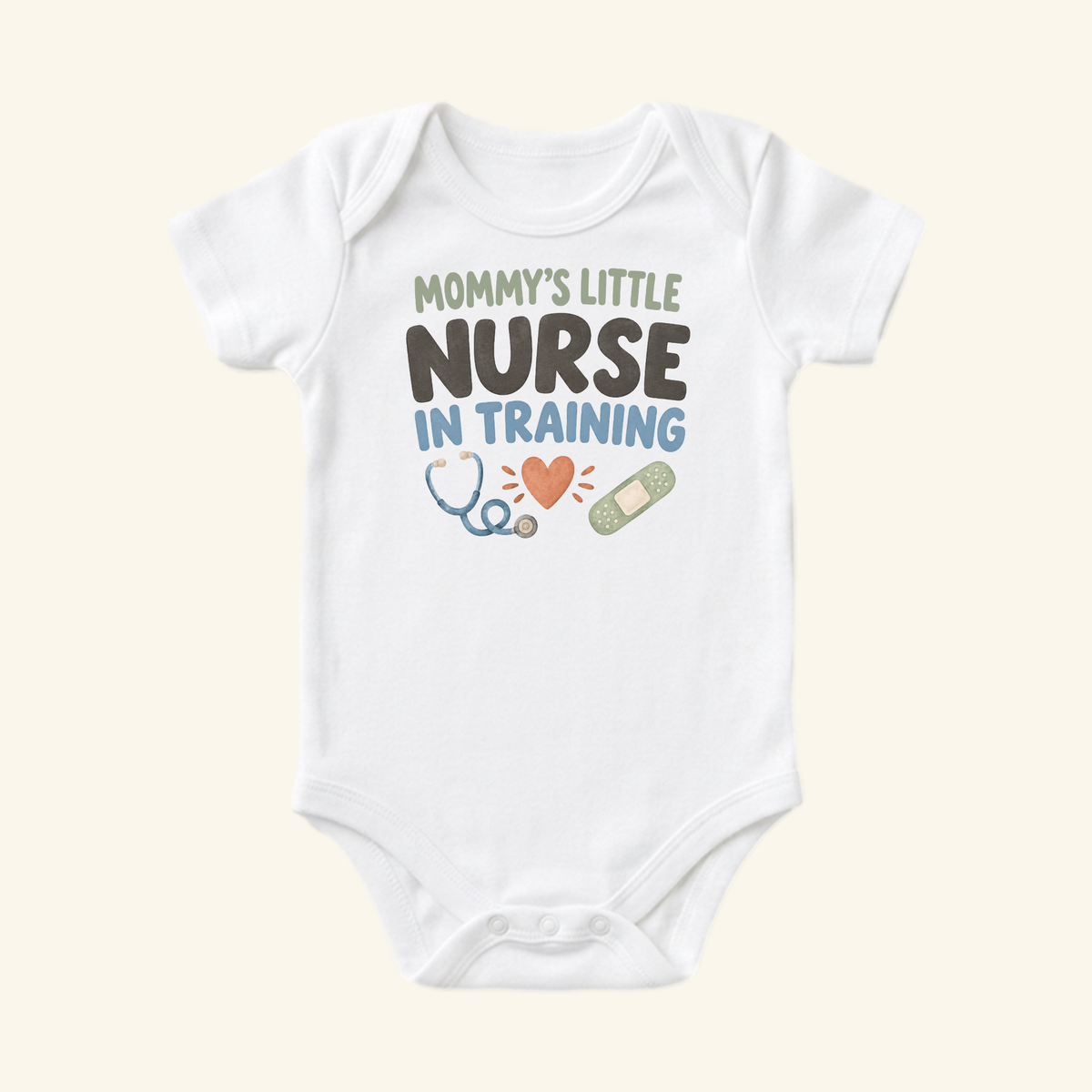 White Mommy’s Little Nurse in Training Baby Onesie printed with Mommy’s little nurse in training above a heart, stethoscope, and bandage graphic.