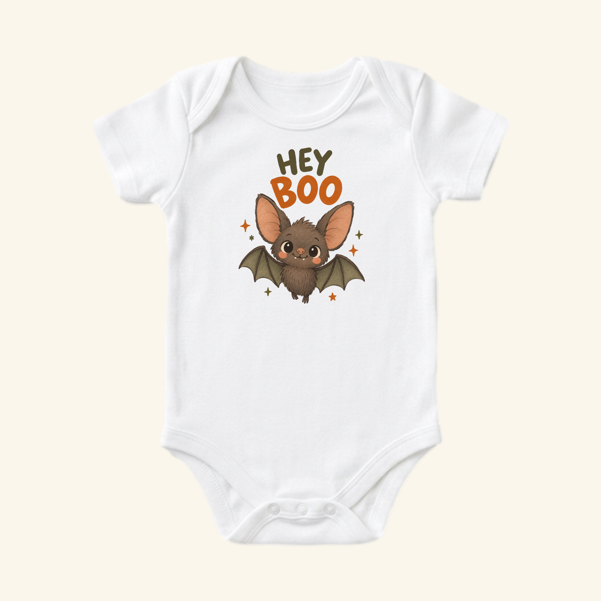 Toodleroos Hey Boo Bat Baby Halloween Onesie, a white baby bodysuit featuring a cute bat illustration and the text HEY BOO.