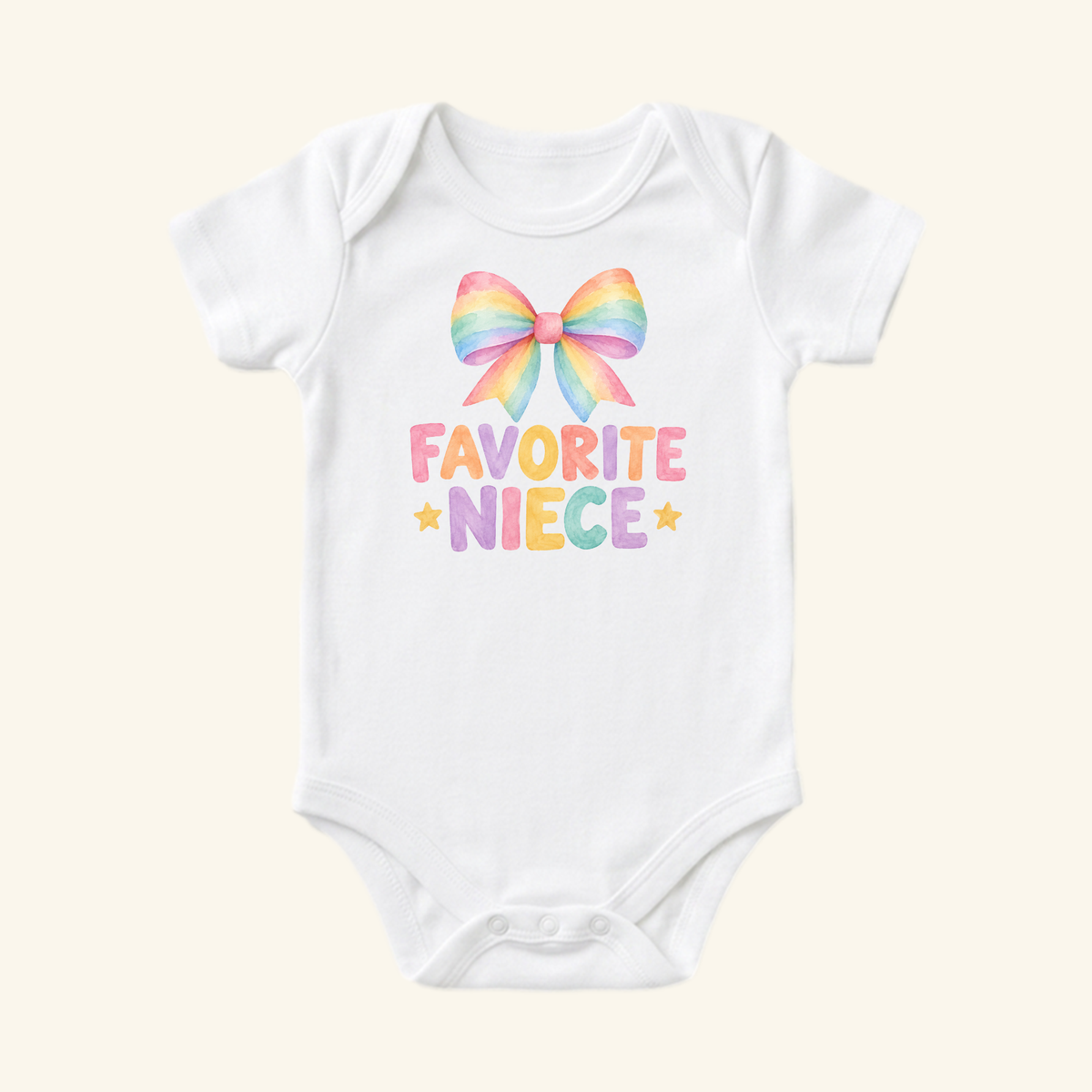 Toodleroos Favorite Niece Baby Onesie – Cute Rainbow Bow Bodysuit, a white short-sleeved baby girl bodysuit featuring a rainbow-colored bow graphic and the text FAVORITE NIECE in multi-colored letters.