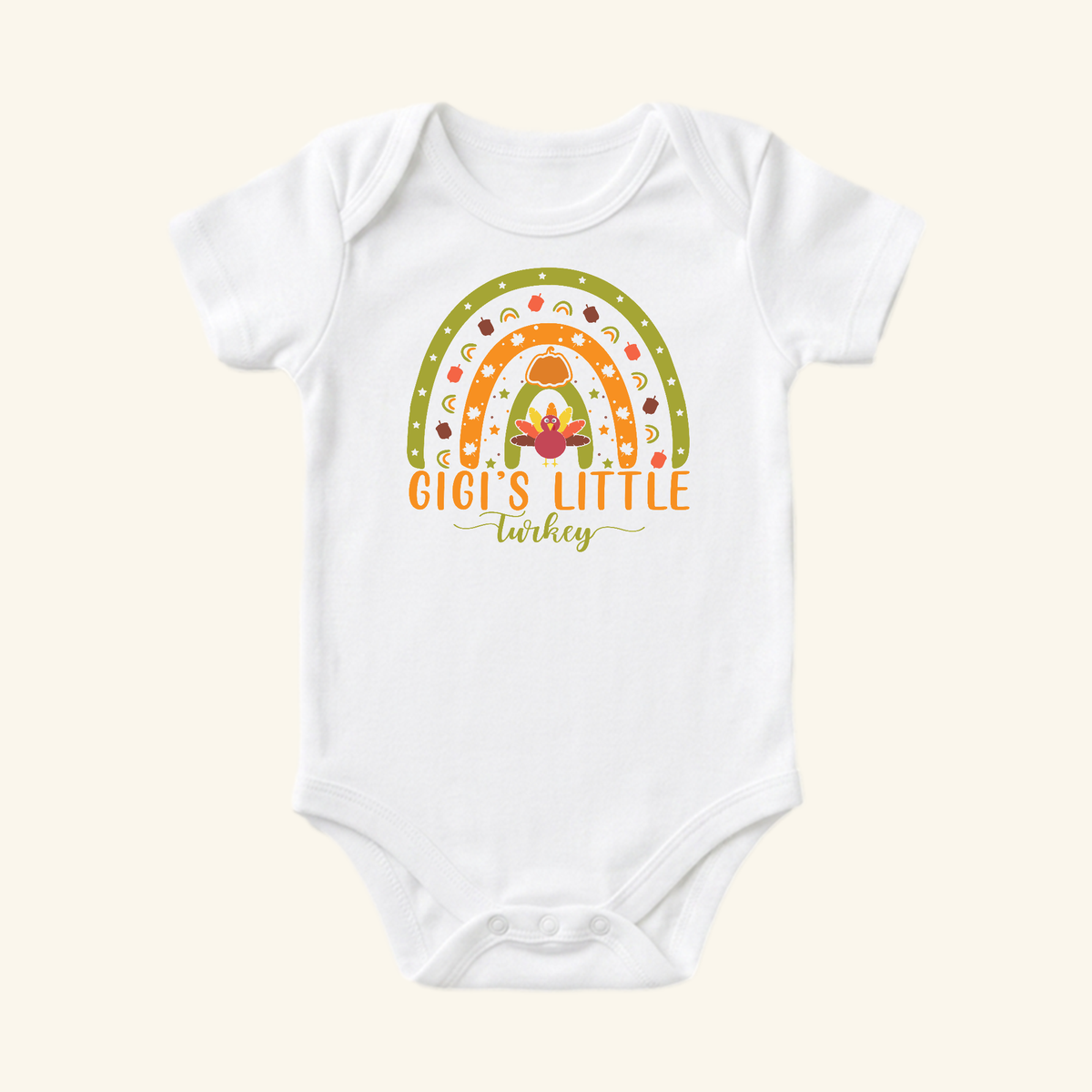 Toodleroos Gigi’s Little Turkey Baby Onesie – Grandma Thanksgiving Rainbow Bodysuit featuring a colorful rainbow, turkey, and pumpkin graphic with the text Gigi’s Little Turkey printed below, perfect for a baby’s first Thanksgiving.