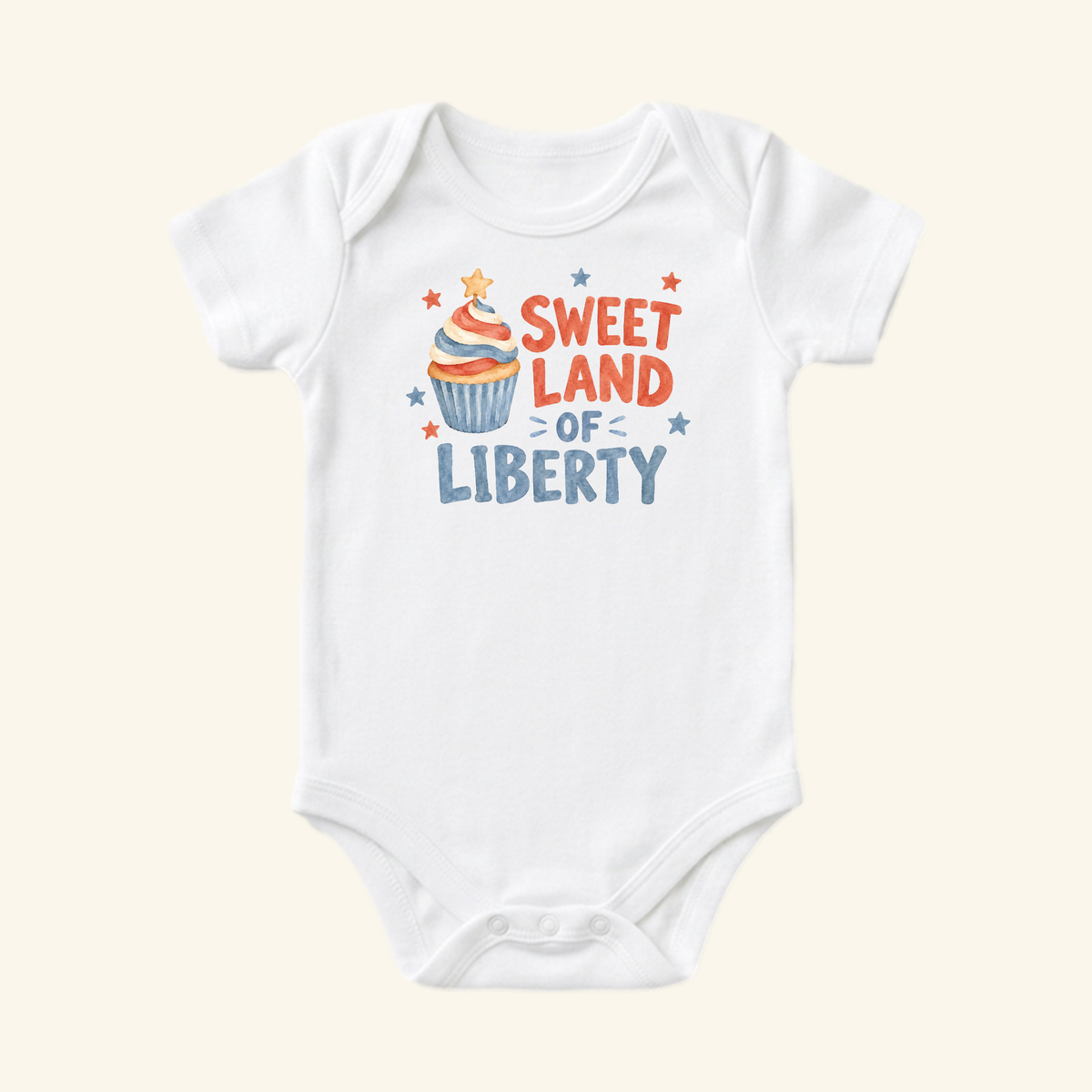 Sweet Land of Liberty Baby Onesie – Patriotic Cupcake Bodysuit featuring a white 4th of July bodysuit with a red, white, and blue cupcake graphic and the text Sweet Land of Liberty.