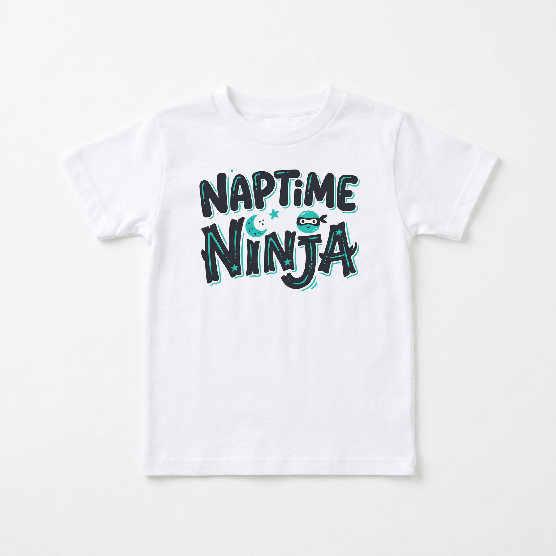 A white kids' short-sleeve t-shirt with a playful graphic reading 'NAPTIME NINJA' in dark teal and light blue bubble letters, featuring a small cartoon ninja character.