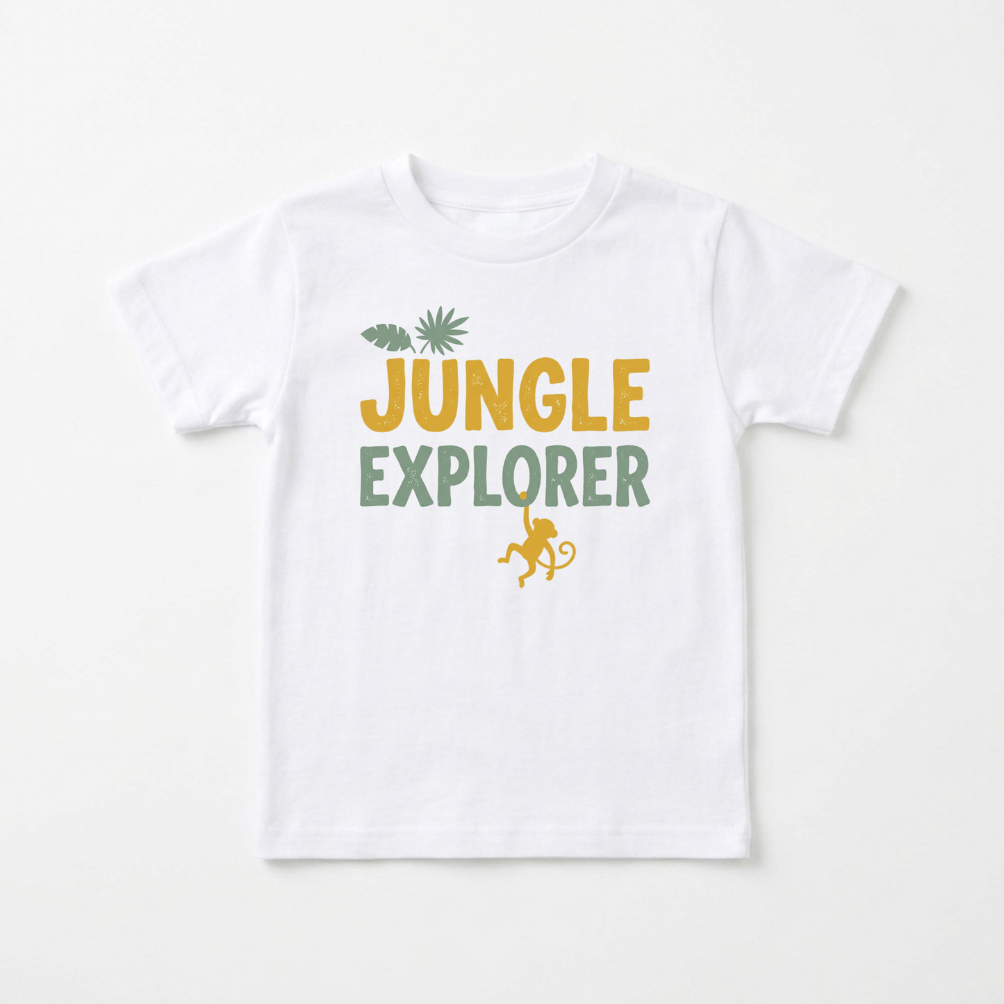 A white short-sleeve kids' t-shirt with a 'JUNGLE EXPLORER' graphic on the chest, featuring a yellow monkey, green leaves, and yellow and green text, displayed flat against a light background.