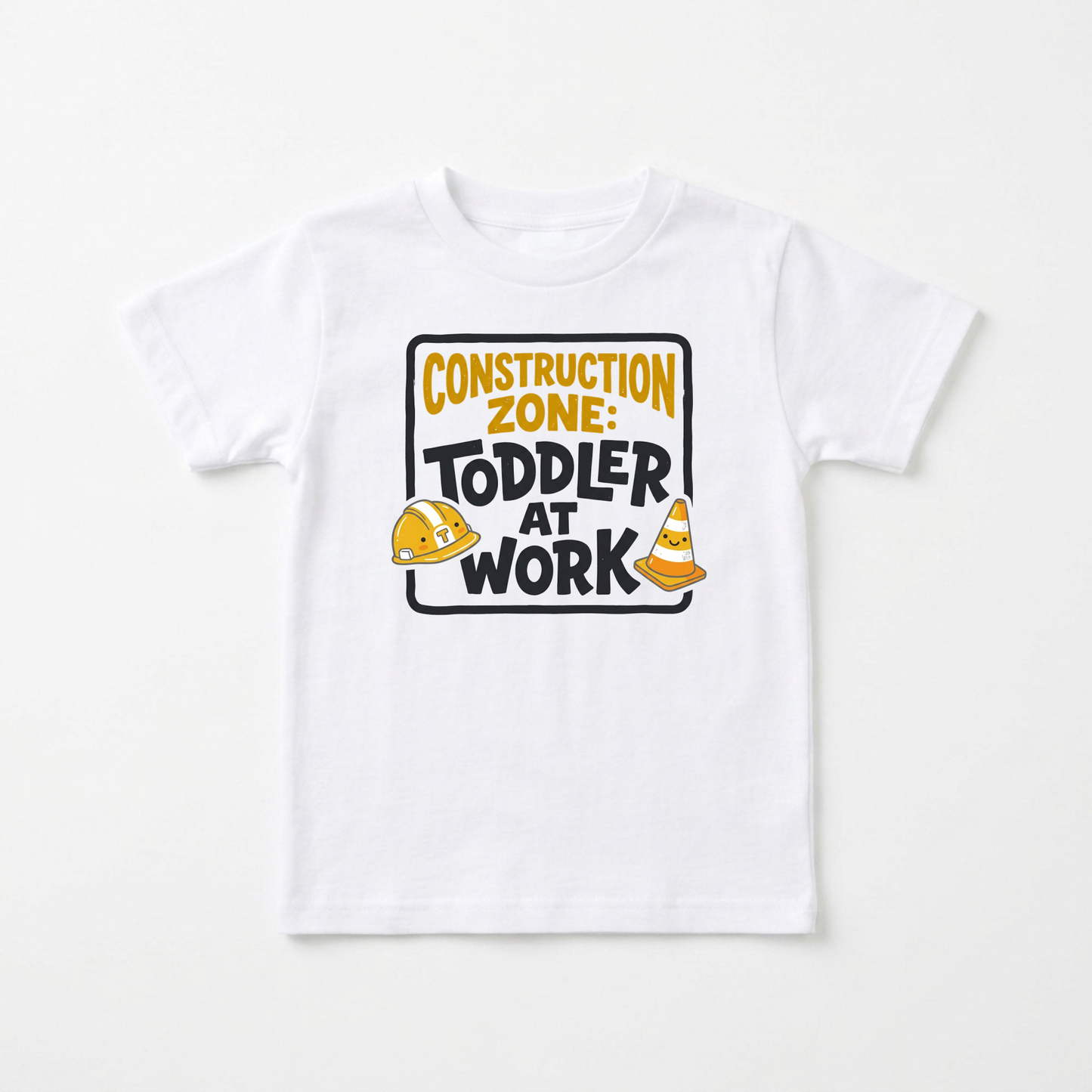 A white short-sleeve kids' t-shirt with a 'Construction Zone: Toddler at Work' graphic on the chest, featuring a yellow hard hat, orange traffic cone, and black text, displayed flat against a light background.