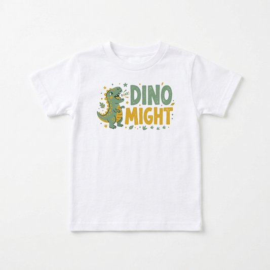 A white short-sleeve kids' t-shirt with a 'DINO MIGHT' graphic on the chest, featuring a green cartoon T-Rex and yellow and green lettering, displayed on a clean white background.