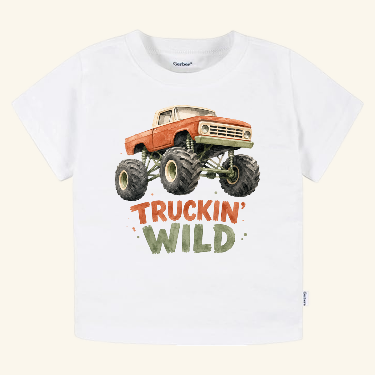 White short-sleeve Monster Truck Toddler Shirt – Truckin’ Wild Short-Sleeve Tee with a watercolor monster truck illustration above the text TRUCKIN WILD.
