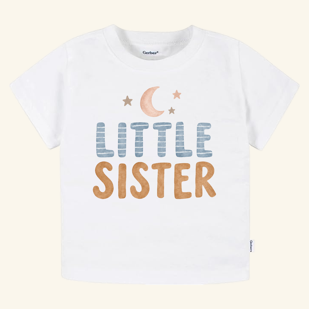 Toodleroos Little Sister Toddler Shirt – Moon and Stars Sibling Tee featuring a moon and stars illustration above the text LITTLE SISTER in blue and tan on a white toddler tee.