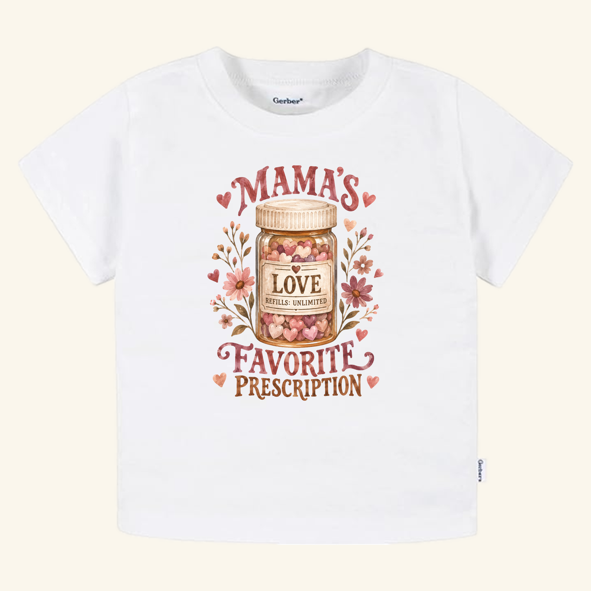 Mama’s Favorite Prescription Toddler Shirt featuring a white tee with a jar graphic filled with hearts labeled LOVE and REFILLS: UNLIMITED, surrounded by florals and the text MAMAS FAVORITE PRESCRIPTION.