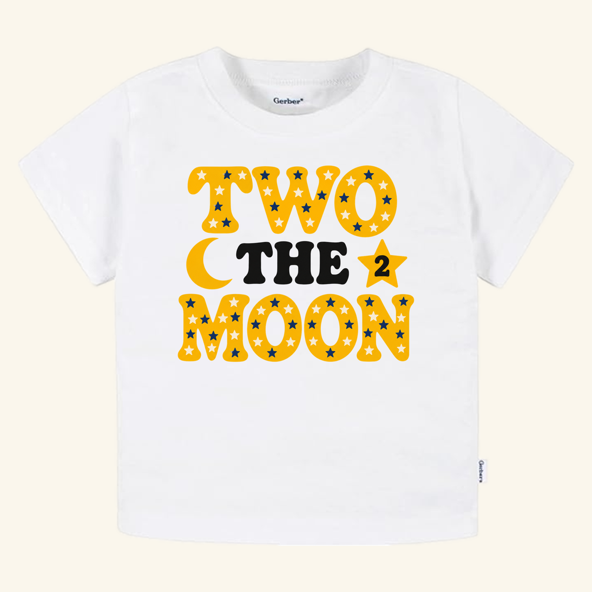 Toodleroos 2nd Birthday Toddler Shirt – Two the Moon Celestial Tee featuring a white t-shirt with yellow TWO THE MOON text patterned with blue stars, a crescent moon, and a star with the number 2.