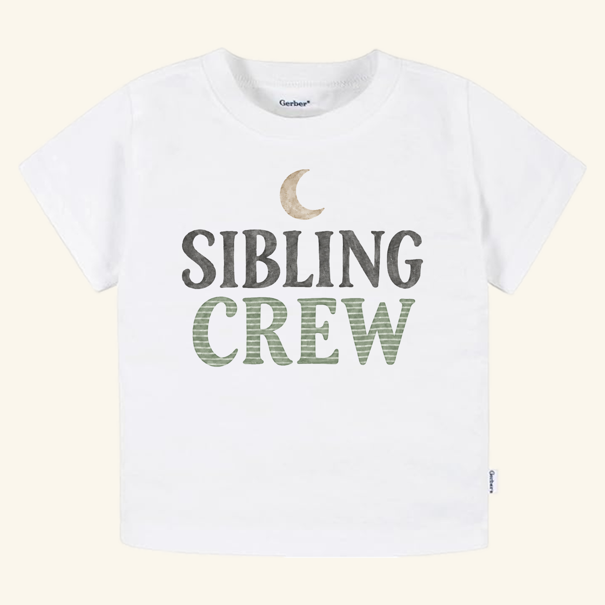 White short-sleeve gender-neutral Sibling Crew Toddler Shirt – Moon Matching Sibling Tee featuring a crescent moon graphic above the text Sibling Crew.