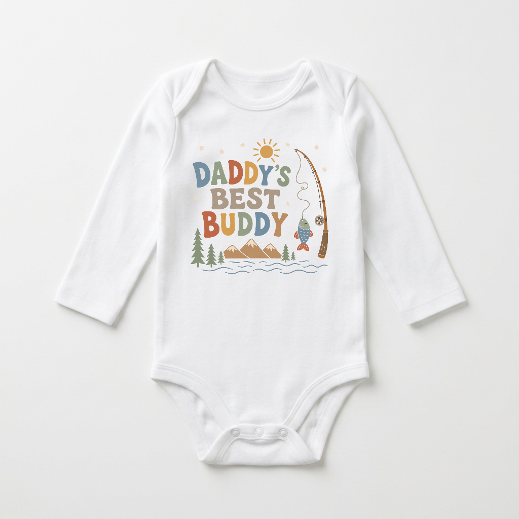 Dress your little adventurer in the Toodleroos Long-Sleeve Baby Boy Fishing Onesie – Daddy’s Best Buddy Bodysuit, a white onesie featuring playful graphics of mountains, trees, sun, water, and a fishing pole catching a fish along with “Daddy’s Best Buddy” text. Laid flat on a white background, this charming long-sleeve bodysuit is the perfect choice for daddy’s best buddy!.
