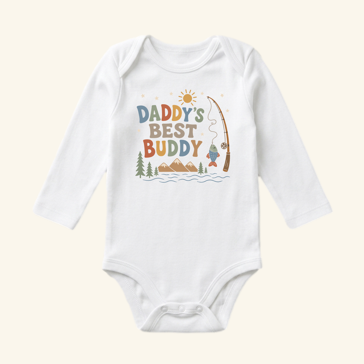 White long-sleeve Daddy’s Best Buddy Baby Onesie – Fishing Bodysuit featuring a graphic of mountains, trees, a fishing pole, and the text Daddy’s Best Buddy.