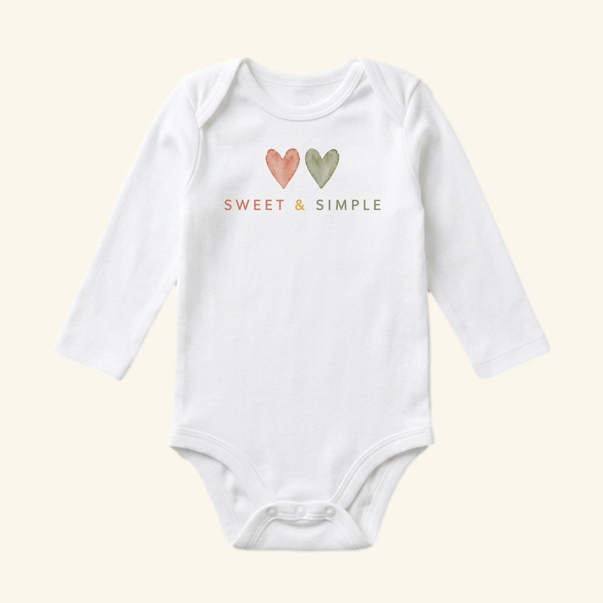 Toodleroos Gender-Neutral Baby Onesie – Sweet & Simple Heart Bodysuit, a white long-sleeve bodysuit featuring a watercolor heart design and the text SWEET & SIMPLE.