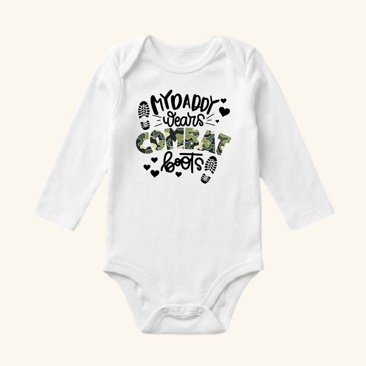 Toodleroos Military Baby Onesie – My Daddy Wears Combat Boots Bodysuit in white with long sleeves, featuring the text My daddy wears combat boots with small boot print and heart icons.