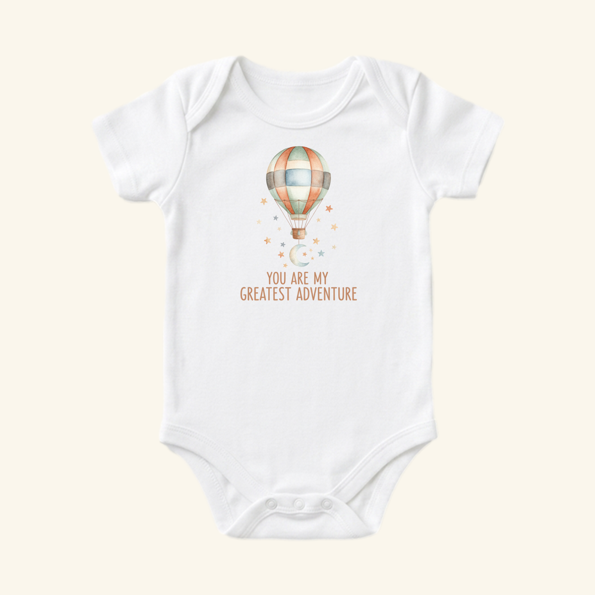 White You Are My Greatest Adventure Baby Onesie – Hot Air Balloon Bodysuit featuring a watercolor hot air balloon with stars, a crescent moon, and the text YOU ARE MY GREATEST ADVENTURE below.